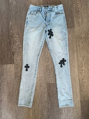 Chrome Hearts Light Wash Skinny Jeans with Black Cross Patches